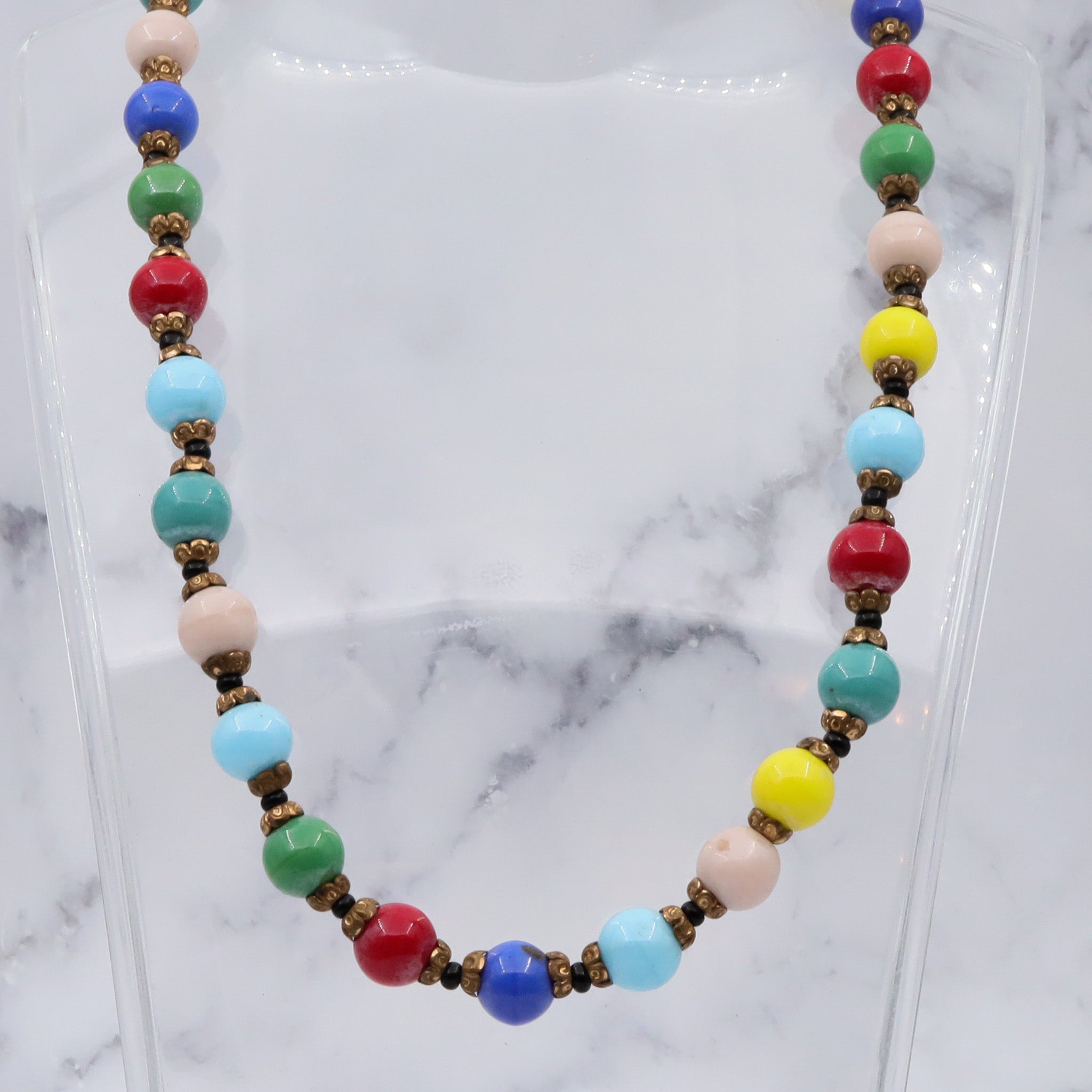 Antique rainbow glass beaded necklace with brass spacers, 16.5"